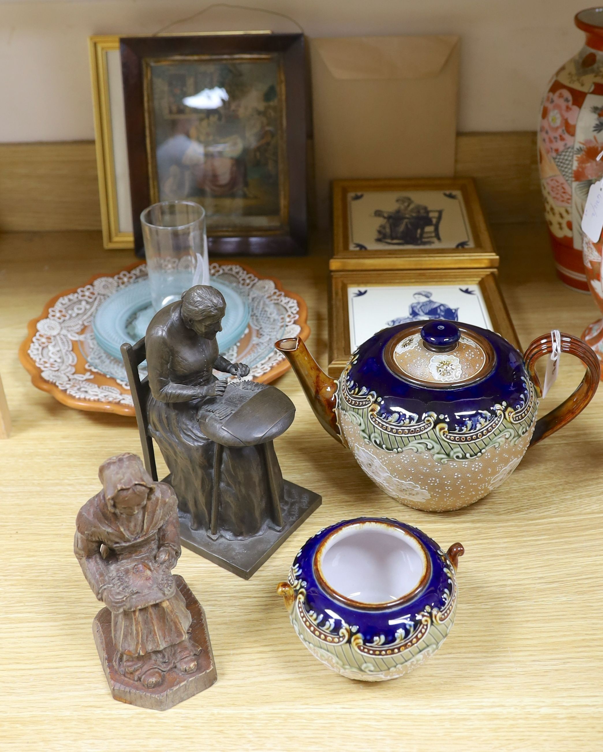 A cold cast bronze, Bobbin lace maker, similar carved wood figure, ceramic lace-pattern dish etc